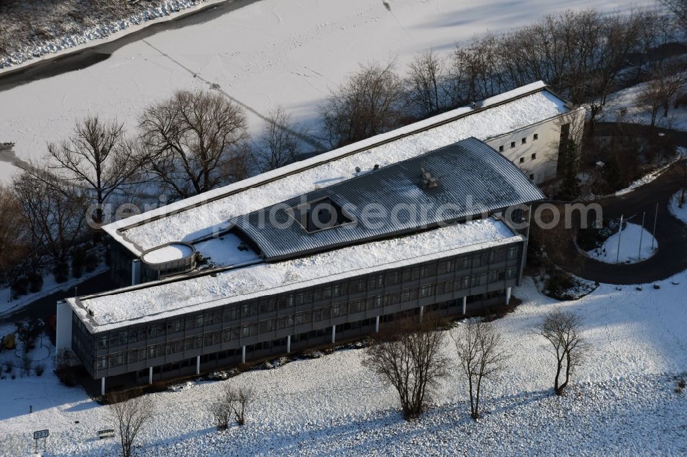 Magdeburg from above - Wintry snowy administrative building of the State Authority WSNBA Wasserstrassen-Neubauamt am Kleiner Werder in Magdeburg in the state Saxony-Anhalt