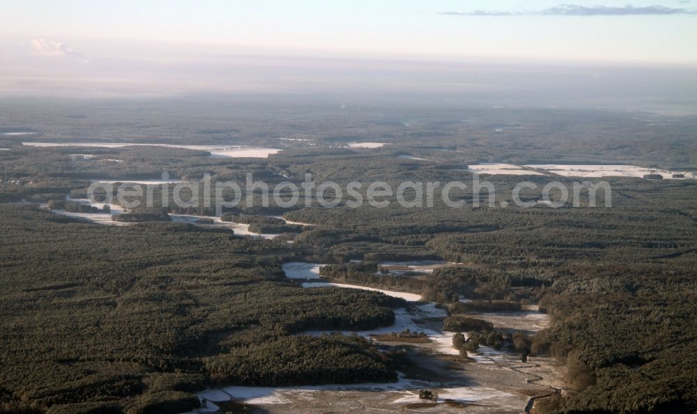 Schorfheide from the bird's eye view: Wintry snowy wooded area in Schorfheide in the state Brandenburg