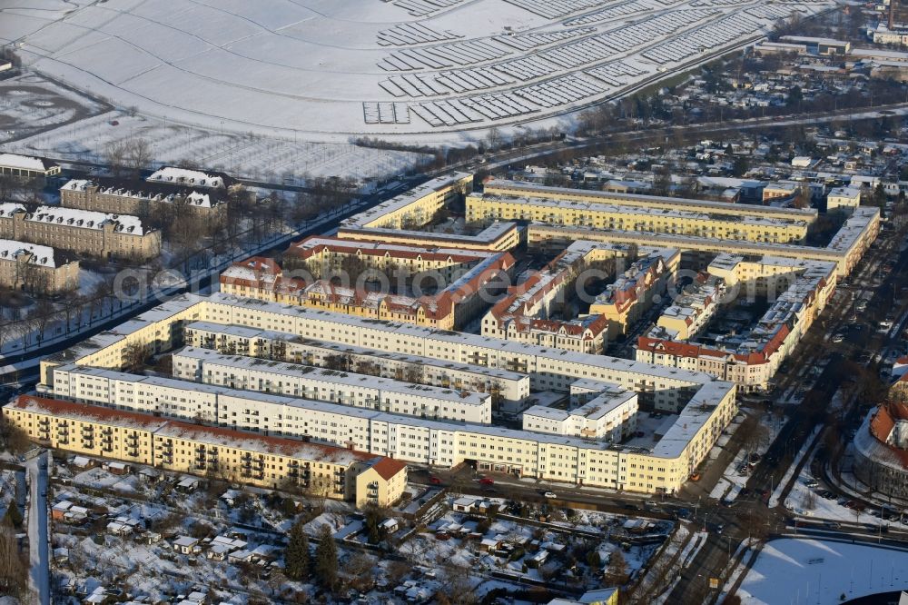 Aerial photograph Magdeburg - Winterly snowy residential area of a multi-family house settlement Berliner Chaussee Ecke Georg-Heiler-Strasse in Magdeburg in the state Saxony-Anhalt