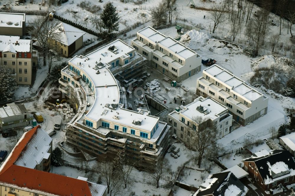 Aerial photograph Berlin - Wintry snowy residential building construction site of Cardinal Place GmbH & Co. KG in Berlin Koepenick