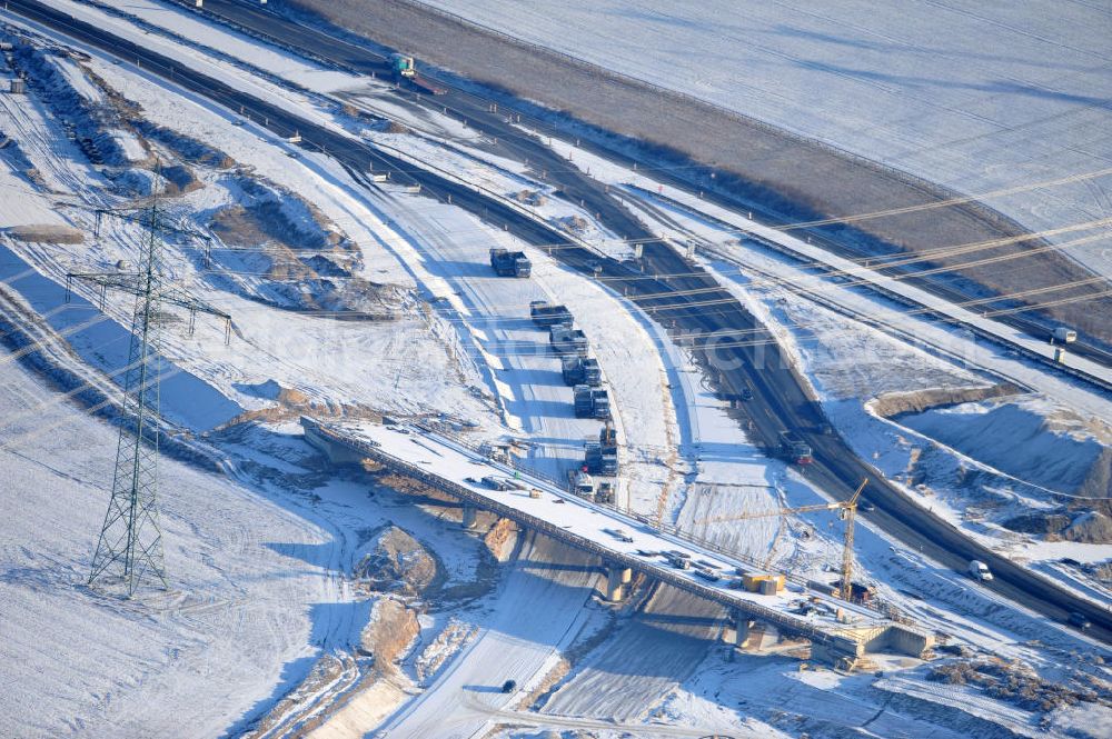 Aerial photograph SCHWANEBECK - View of the construction site at the highway triangle Kreuz Barnim by snow