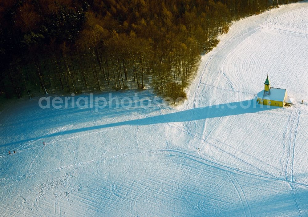 Kelheim from above - The wintry, snowy chapel of St. Bartholomew's Church at Kelheim in Bavaria