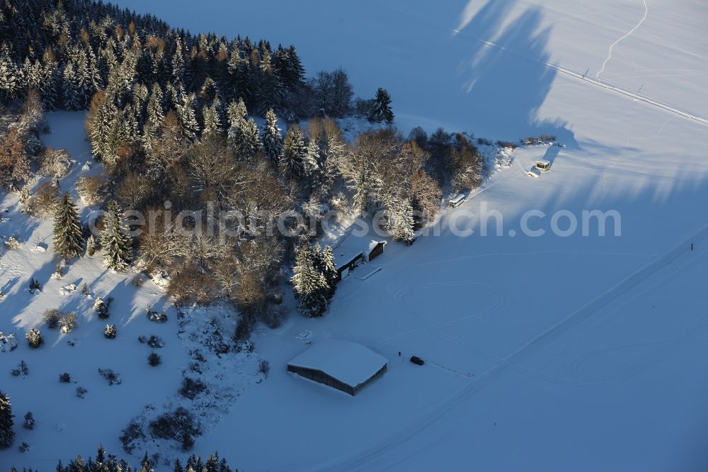 Bad Ditzenbach from the bird's eye view: Wintery snow-covered runway and environment - taxiway grounds of the airfield Bad Ditzenbach am Eichbuehl in Bad Ditzenbach in the state Baden-Wuerttemberg