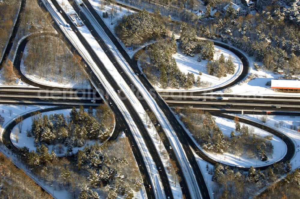 Berlin from above - Blick auf den winterlich verschneite Autobahnkreuz Zehlendorf an der A115 / B1.