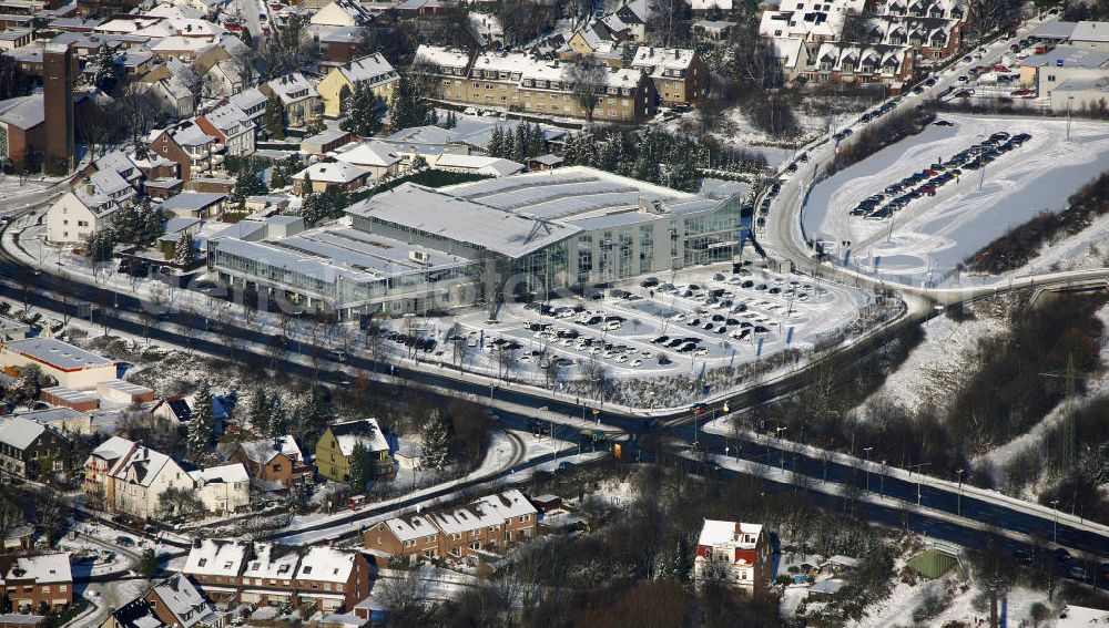 Bottrop from the bird's eye view: Blick auf das winterlich verschneite Brabus-Gelände in Bottrop, Nordrhein-Westfalen. Brabus ist ein bekannter Tuner und Automobilhersteller mit mehreren Filialen, deutschlandweit. View of the snowy winter terrain Brabus in Bottrop, North Rhine-Westphalia. Brabus is a renowned tuner and car manufacturer has several branches throughout Germany.