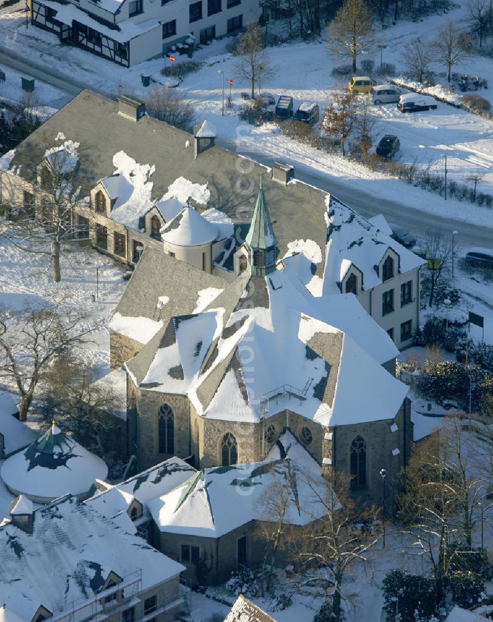 Aerial image Bochum - Blick auf das winterlich verschneite Kloster Stiepel in Bochum, Nordrhein-Westfalen. Das Kloster wurde 1988 gegründet und untersteht dem Abt von Stift Heiligenkreuz, einer Abtei in Österreich. Das Kloster gilt als ein Wallfahrtsort der katholischen Kirche. View of the snowy winter monastery Stiepel in Bochum, North Rhine-Westphalia. The monastery was founded in 1988 and is subject to the Abbot of Heiligenkreuz, a monastery in Austria. The monastery is a place of pilgrimage of the Catholic Church.