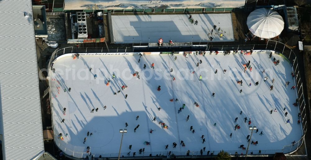 Aerial photograph Berlin - Wintry white shining ice covering the Eisbahn Lankwitz Leonorenstrasse in Berlin in Germany