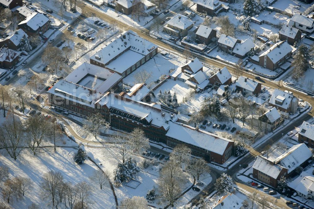 Aerial photograph Haltern - Blick auf die winterliche Innenstadt von Haltern im nördlichen Ruhrgebiet. Die Stadt gehört zum Kreis Recklinghausen und untersteht dem Regierungsbezirk Münster. Das neue Rathaus befindet sich in der Dr. Conrads-Str.1. View of the wintry inner city of Haltern in the northern Ruhr area. The city belongs to the district of Recklinghausen, reporting to the government district of Münster. The new City Hall is located in the Dr. Conrad-Str.1.