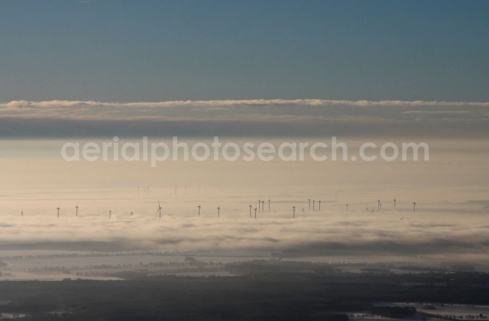 Aerial image Tempelfelde - Wintry inversion - wind turbines in heavy fog on a field in Tempelfelde in Brandenburg