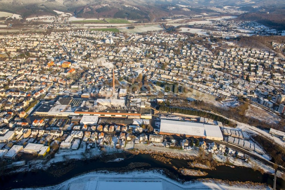 Aerial image Arnsberg - Wintry View of snow-covered Arnsberg with the Reno De Medici work in the state of North Rhine-Westphalia. The producer of cardboard products has its works in the West of the town