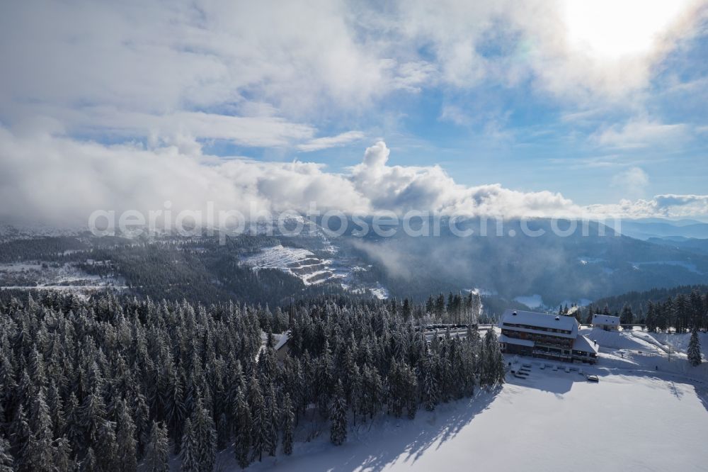 Seebach from above - Wintry snowy Riparian areas on the lake area of Mummelsee in Seebach in the state Baden-Wuerttemberg