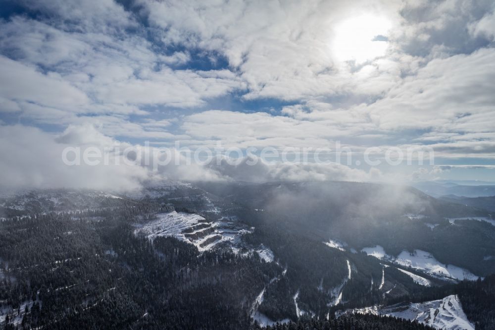 Aerial image Seebach - Wintry snowy Quarry for the mining and handling of Granit in Seebach in the state Baden-Wuerttemberg