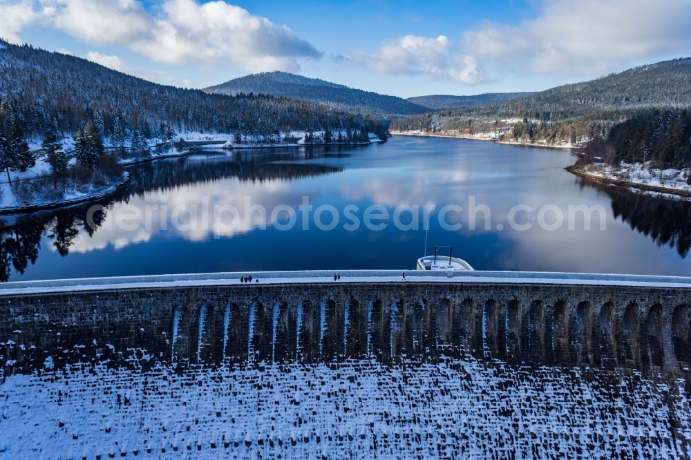 Aerial image Forbach - Wintry snowy Dam and shore areas at the lake Schwarzenbachtalsperre in Forbach in the state Baden-Wuerttemberg