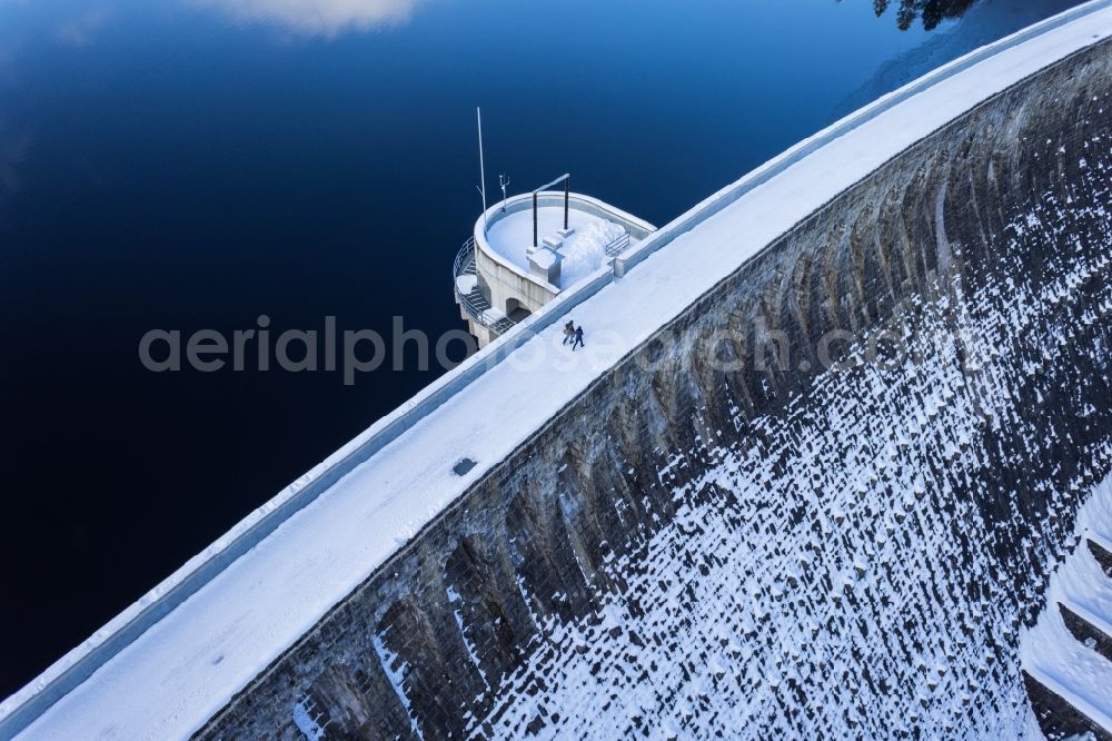 Forbach from above - Wintry snowy Dam and shore areas at the lake Schwarzenbachtalsperre in Forbach in the state Baden-Wuerttemberg