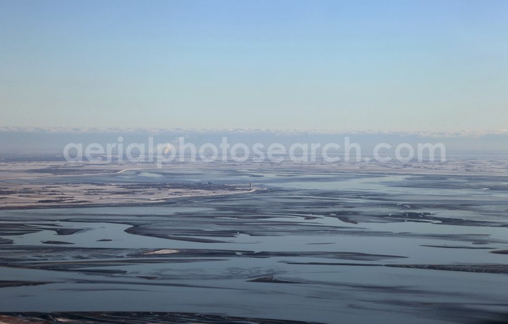 Büsum from the bird's eye view: Wintry Wadden Sea in Buesum in Schleswig-Holstein. View in southeast direction