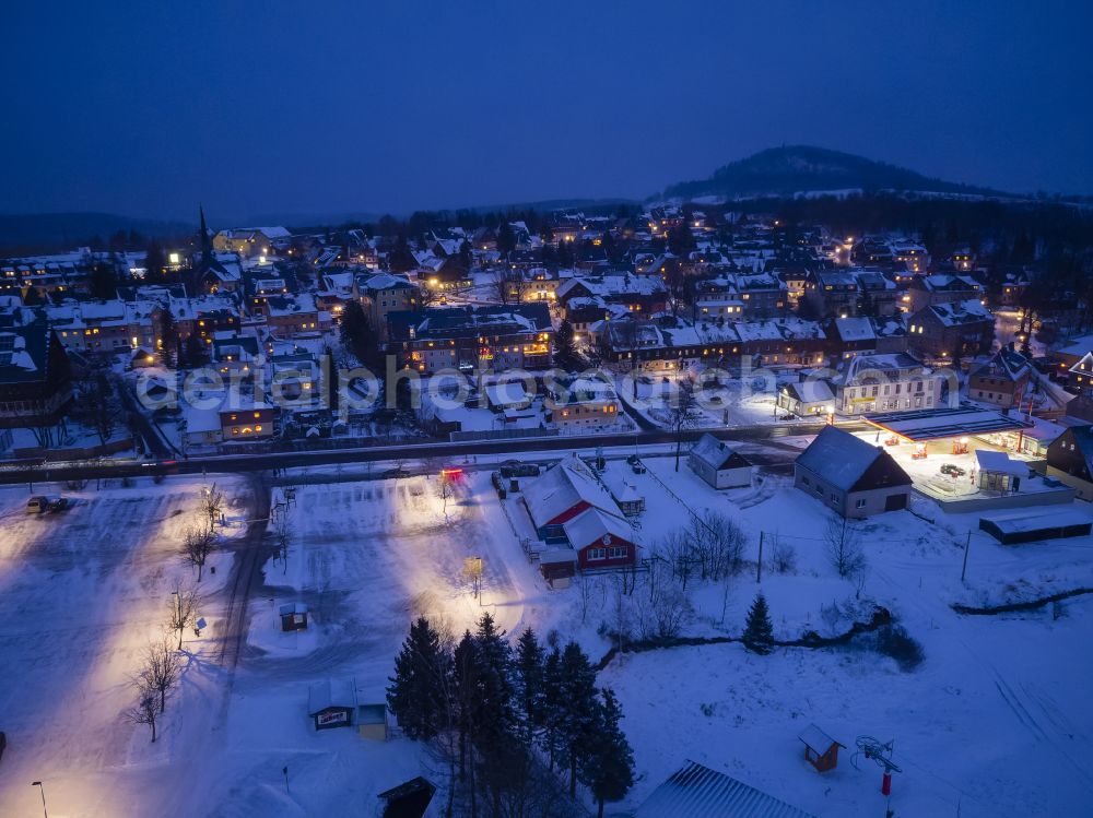 Altenberg from above - Winter snow-covered night lights and illumination in Altenberg in the state of Saxony, Germany