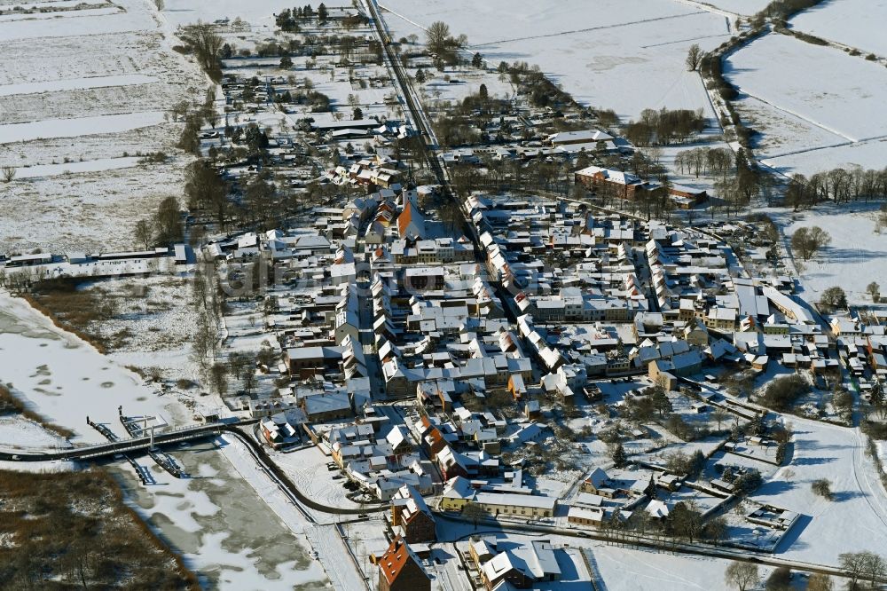 Loitz from the bird's eye view: Wintry snowy old Town area and city center in Loitz in the state Mecklenburg - Western Pomerania, Germany