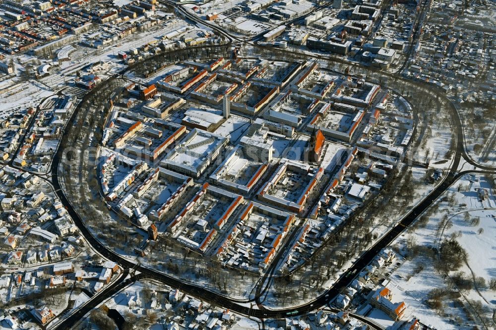 Neubrandenburg from the bird's eye view: Wintry snowy old Town area and city center in Neubrandenburg in the state Mecklenburg - Western Pomerania, Germany