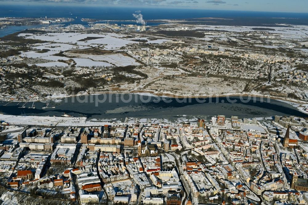 Aerial image Rostock - Wintry snowy old Town area and city center on shore of Unterwarnow in Rostock in the state Mecklenburg - Western Pomerania, Germany