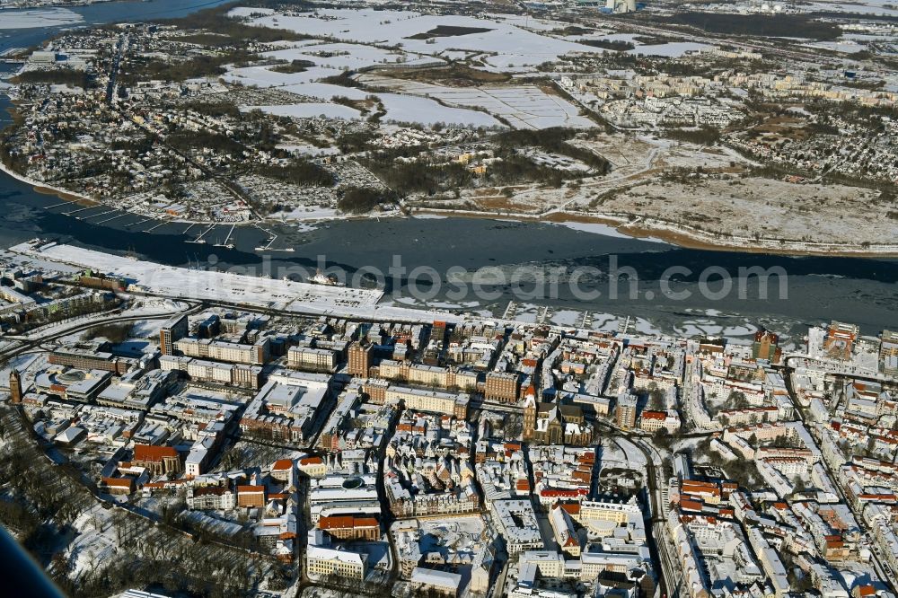 Rostock from above - Wintry snowy old Town area and city center on shore of Unterwarnow in Rostock in the state Mecklenburg - Western Pomerania, Germany