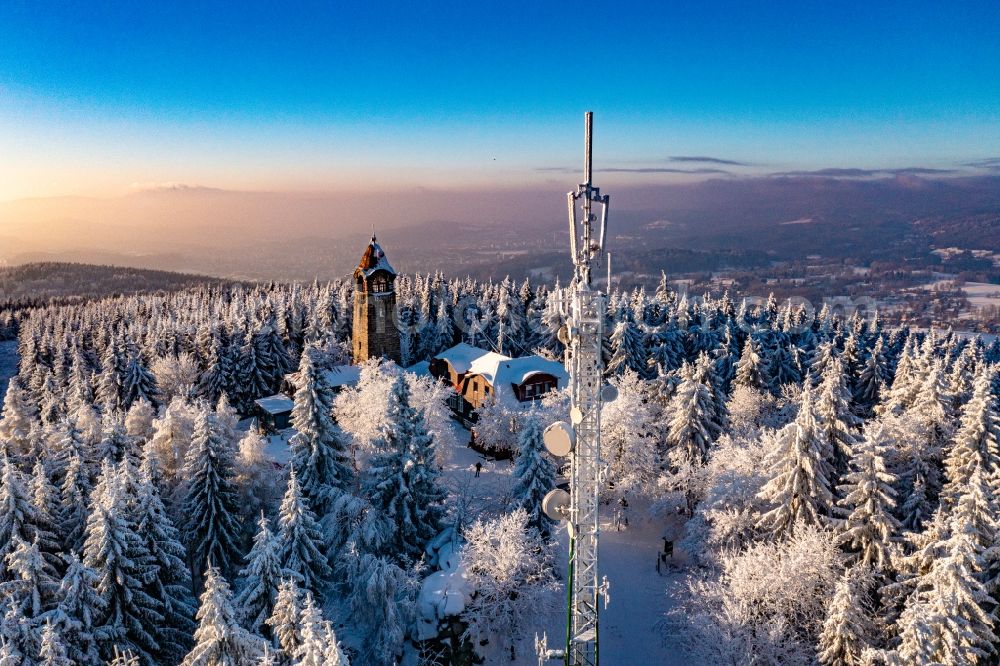 Smrzovka from above - Wintry snowy structure of the observation tower on Cerna studnice - Schwarzbrunnkoppe in Smrzovka Jizera Mountains in Liberecky kraj, Czech Republic