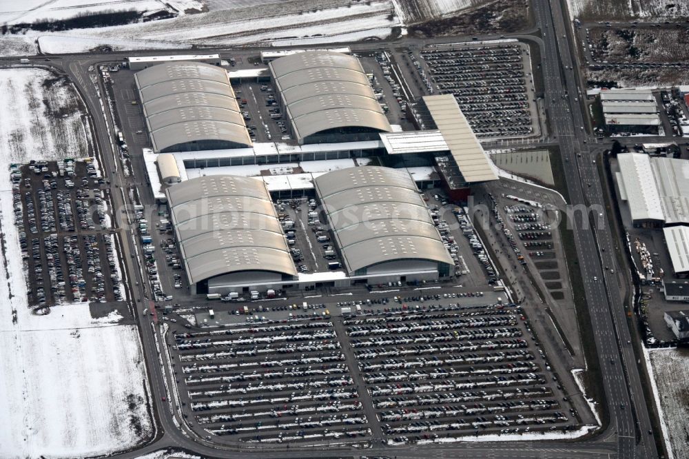 Rheinstetten from above - Wintry snowy Exhibition grounds and exhibition halls of the DM-Arena Karlsruher Messe- and Kongress GmbH in the district Forchheim in Rheinstetten in the state Baden-Wuerttemberg, Germany