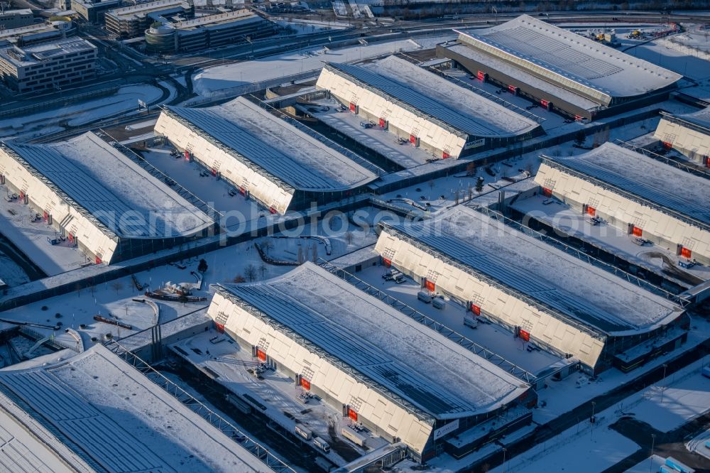 Aerial photograph Leinfelden-Echterdingen - Wintry snowy exhibition grounds and exhibition halls of the Messe in Stuttgart in the state Baden-Wurttemberg, Germany