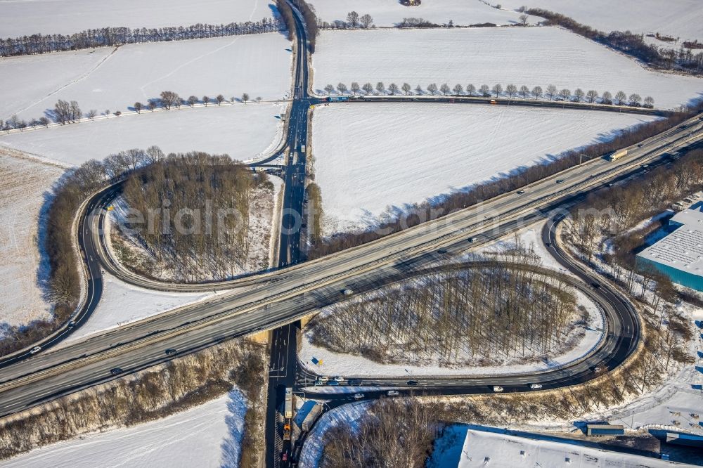 Aerial image Witten - Wintry snowy route and lanes in the course of the exit and access of the motorway junction of the BAB A44 Witten-Annen in Witten at Ruhrgebiet in the state North Rhine-Westphalia, Germany