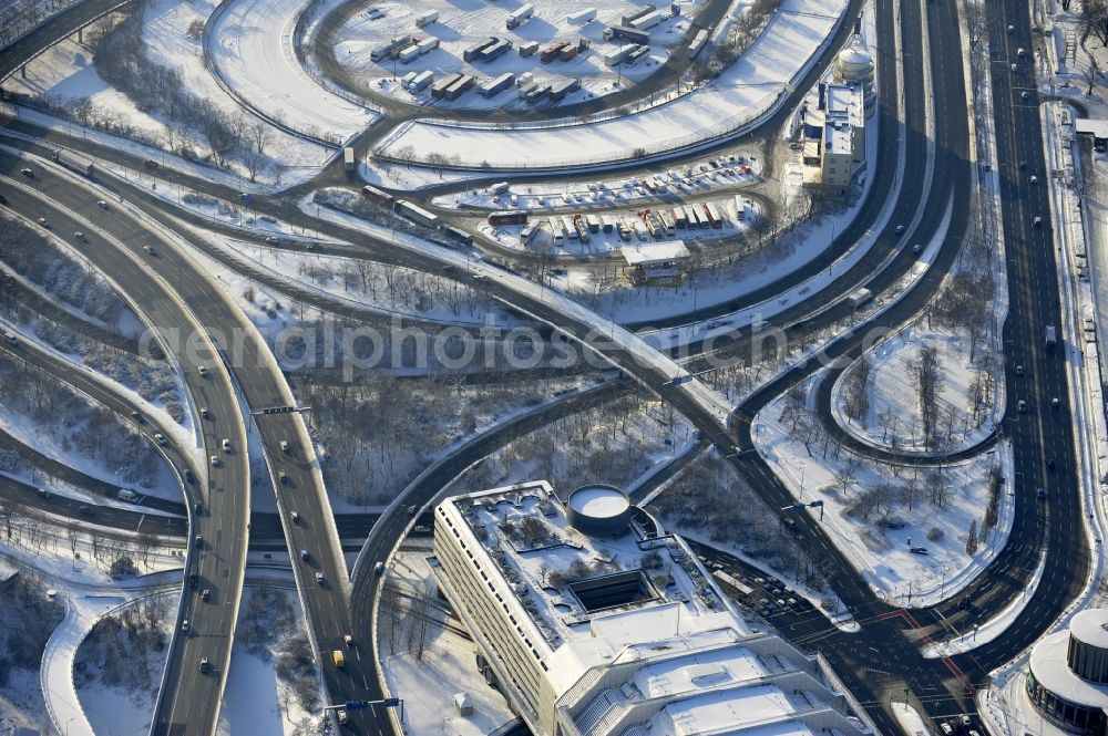 Aerial image Berlin - Wintry snowy highway triangle the federal motorway A 100 to the A115 Autobahndreieck Funkturm in the district Charlottenburg in Berlin, Germany