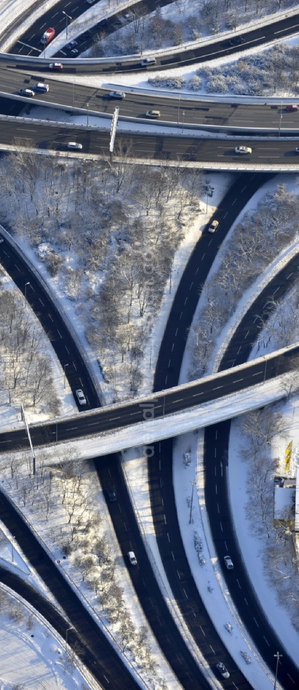 Berlin from above - Wintry snowy highway triangle the federal motorway A 100 to the A115 Autobahndreieck Funkturm in the district Charlottenburg in Berlin, Germany