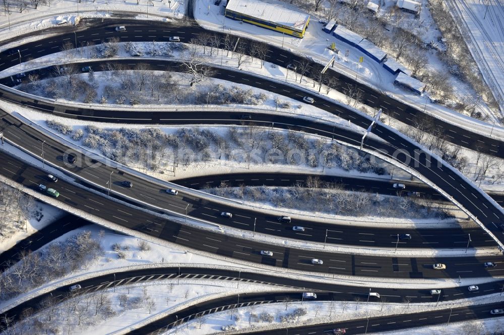 Aerial image Berlin - Wintry snowy highway triangle the federal motorway A 100 to the A115 Autobahndreieck Funkturm in the district Charlottenburg in Berlin, Germany