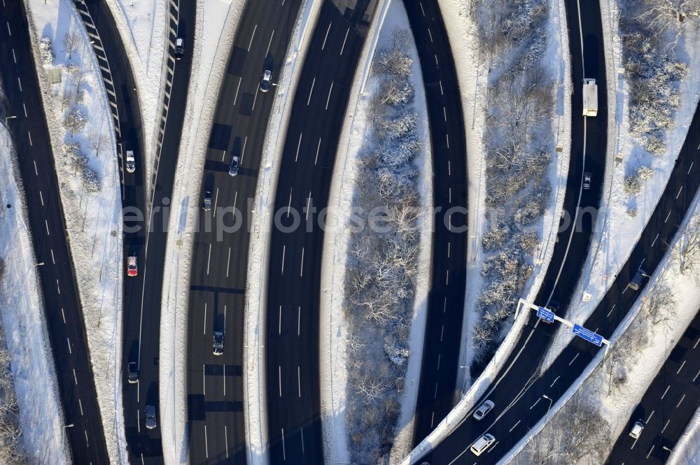 Aerial photograph Berlin - Wintry snowy highway triangle the federal motorway A 100 to the A115 Autobahndreieck Funkturm in the district Charlottenburg in Berlin, Germany