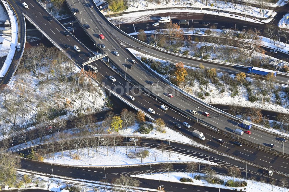 Aerial image Berlin - Wintry snowy traffic flow at the intersection- motorway Funkturm A 100 - A 115 in the district Charlottenburg in Berlin, Germany