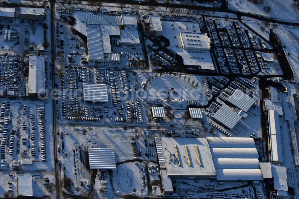 Aerial image Hoppegarten - Wintry snowy car dealership building Automobile BCA Autoauktionen GmbH Neuer Hoenower Weg in the district Dahlwitz-Hoppegarten in Hoppegarten in the state Brandenburg