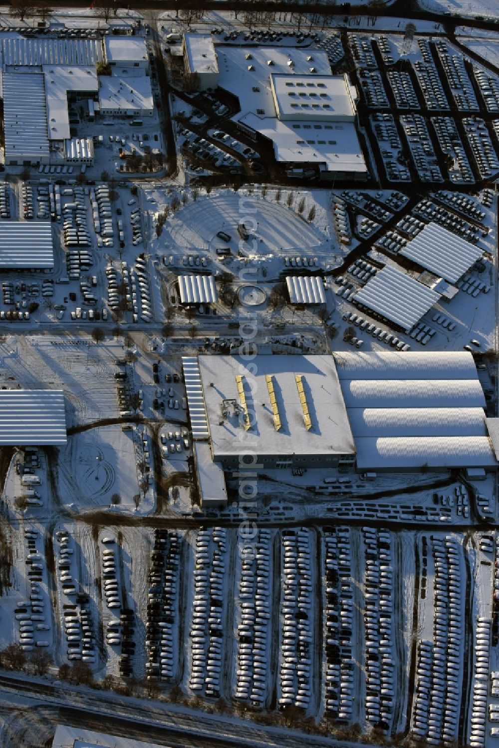 Hoppegarten from above - Wintry snowy car dealership building Automobile BCA Autoauktionen GmbH Neuer Hoenower Weg in the district Dahlwitz-Hoppegarten in Hoppegarten in the state Brandenburg