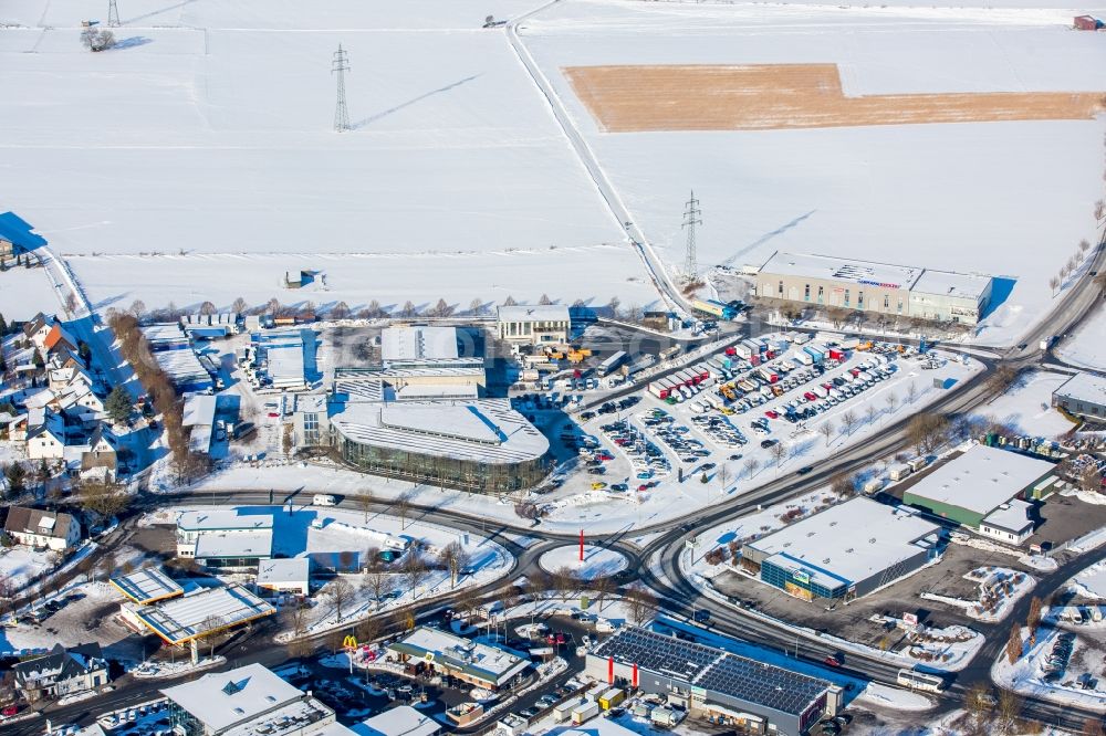 Brilon from the bird's eye view: Wintry snowy Car dealership building Paul Witteler GmbH & Co. KG in Brilon in the state North Rhine-Westphalia