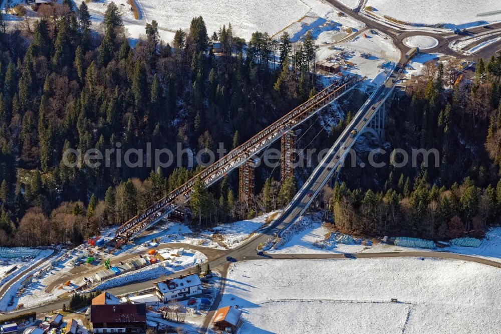 Rottenbruch from the bird's eye view: Wintry snowy New construction of the bridge structure Echelsbacher Bruecke on Ammerschlucht in Rottenbruch in the state Bavaria, Germany