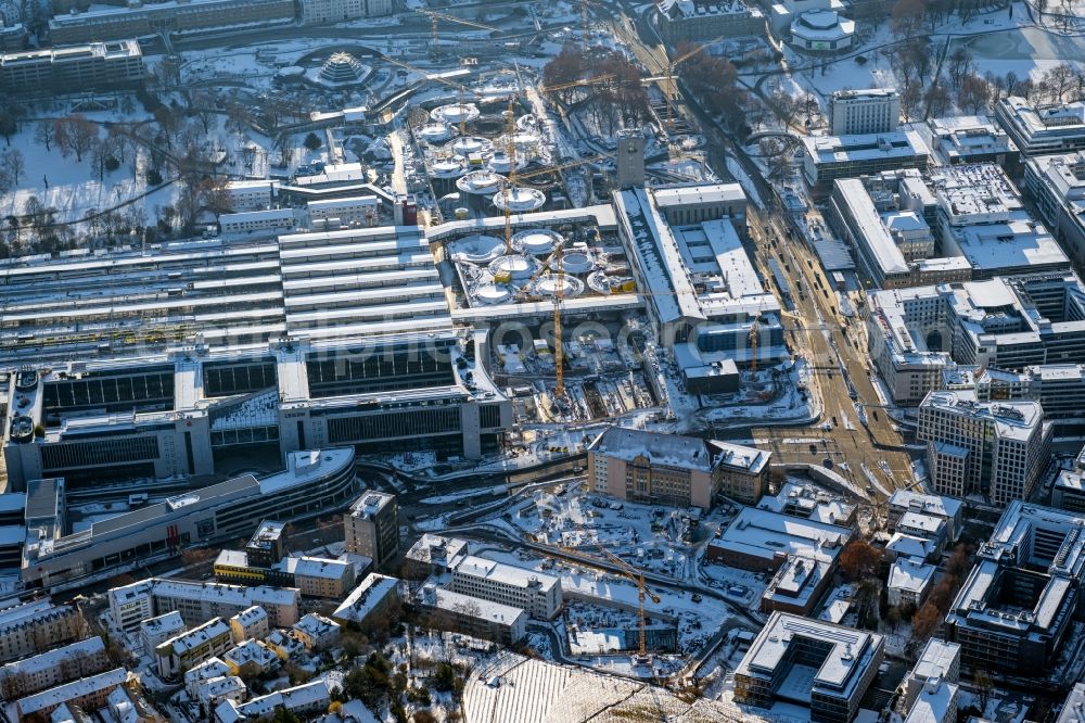 Stuttgart from above - Wintry snowy building of the main station of the railway and construction site for the development project Stuttgart 21 in Stuttgart in the state of Baden-Wurttemberg