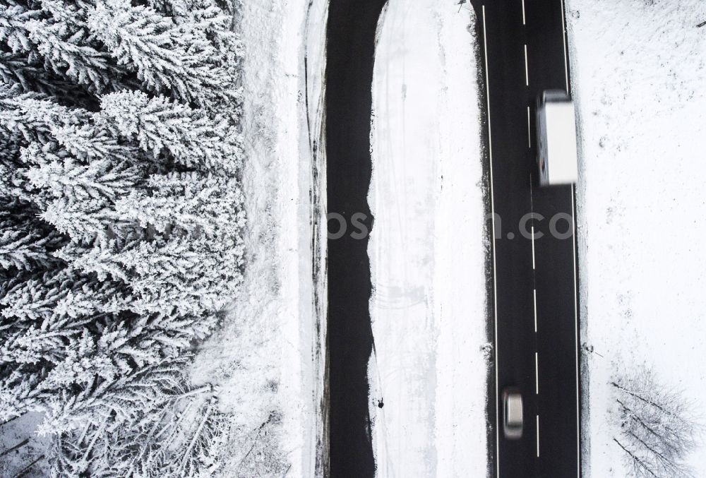 Aerial photograph Sankt Andreasberg - Wintry snowy treetops in a wooded area in Sankt Andreasberg in the state Lower Saxony, Germany