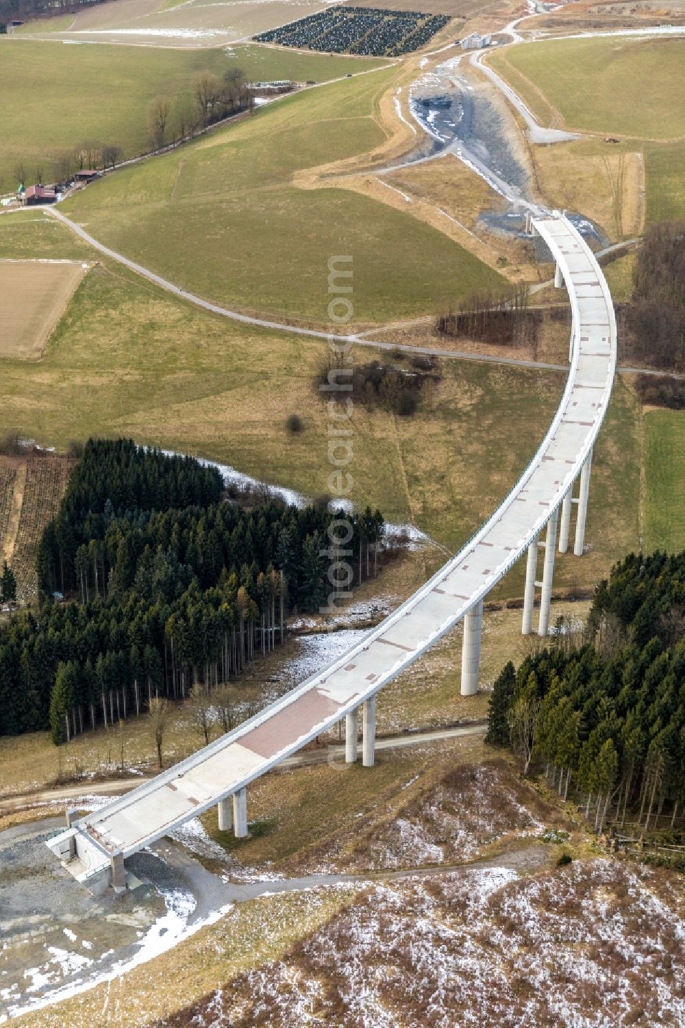 Aerial image Nuttlar - Wintry snowy New construction of the Highway - motorway bridge of the A46 Talbruecke Schormecke - Schormecke Bruecke of BAB A46 in Nuttlar in the state North Rhine-Westphalia, Germany