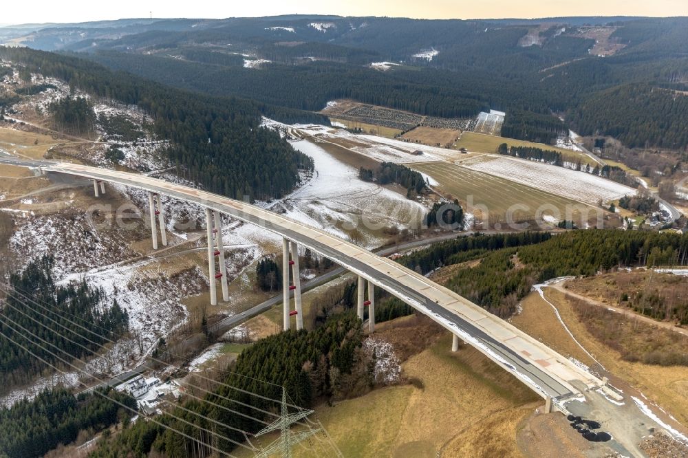 Nuttlar from above - Wintry snowy New construction of the Highway - motorway bridge of the A46 Talbruecke Schormecke - Schormecke Bruecke of BAB A46 in Nuttlar in the state North Rhine-Westphalia, Germany