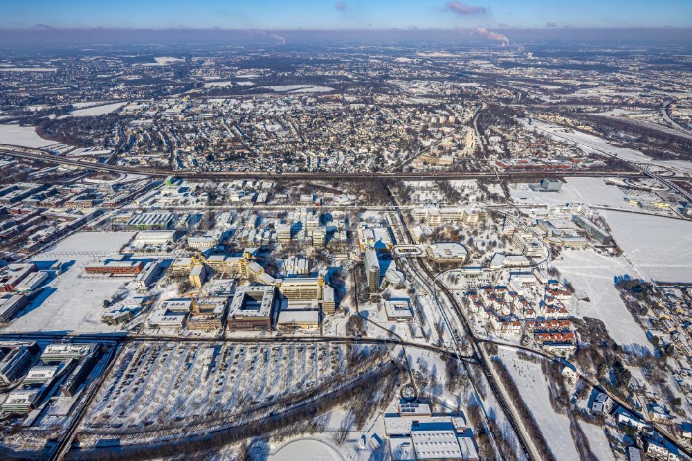 Aerial photograph Dortmund - Wintry snowy construction site for the new building of a research building and office complex of the TU Dortmund on Otto-Hahn-Strasse in Dortmund in the state North Rhine-Westphalia, Germany