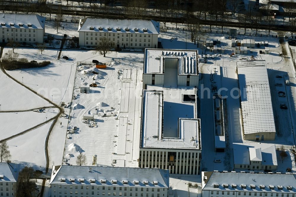 Aerial image Rostock - Wintry snowy construction site for the new building of Maritime Operation Center of Deutschen Marine on Kopernikusstrasse in Rostock in the state Mecklenburg - Western Pomerania, Germany