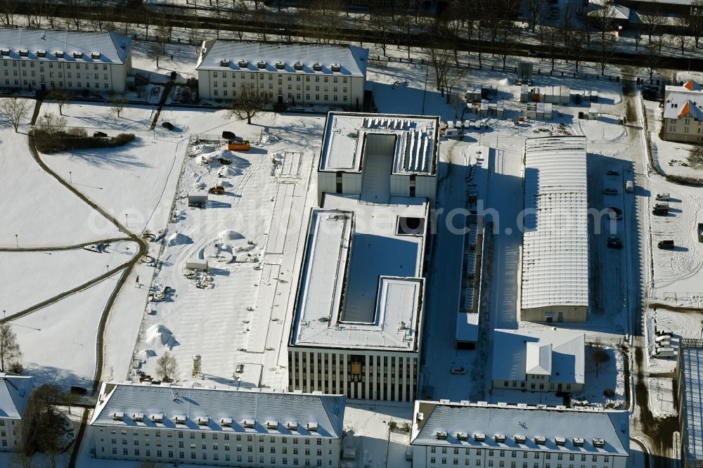 Aerial photograph Rostock - Wintry snowy construction site for the new building of Maritime Operation Center of Deutschen Marine on Kopernikusstrasse in Rostock in the state Mecklenburg - Western Pomerania, Germany