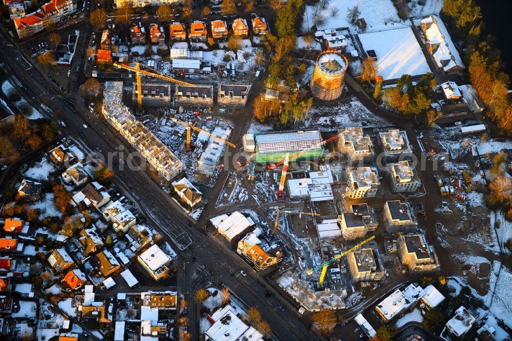 Aerial image Lübeck - Wintry snowy construction site to build a new multi-family residential complex on Ratzeburger Allee - Zum Wasserspeicher in Luebeck in the state Schleswig-Holstein, Germany