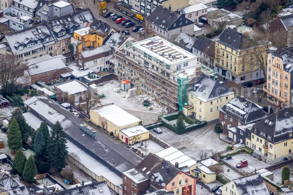 Dortmund from above - Wintry snowy construction site for the multi-family residential building on street Alte Benninghofer Strasse in the district Clarenberg in Dortmund at Ruhrgebiet in the state North Rhine-Westphalia, Germany