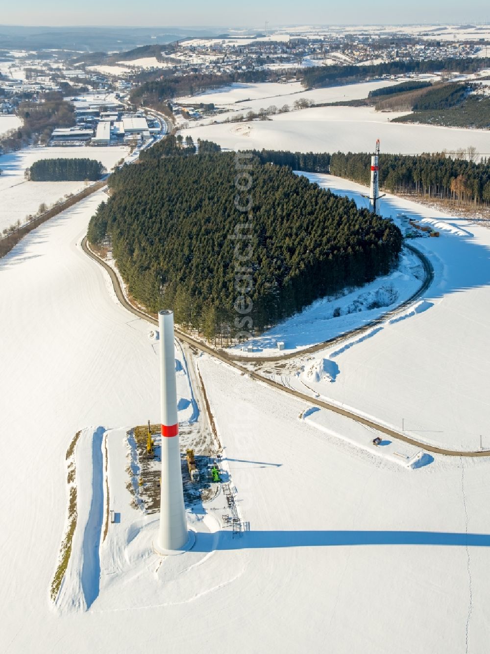 Aerial photograph Rüthen - Wintry snowy construction site for wind turbine installation in Ruethen in the state North Rhine-Westphalia