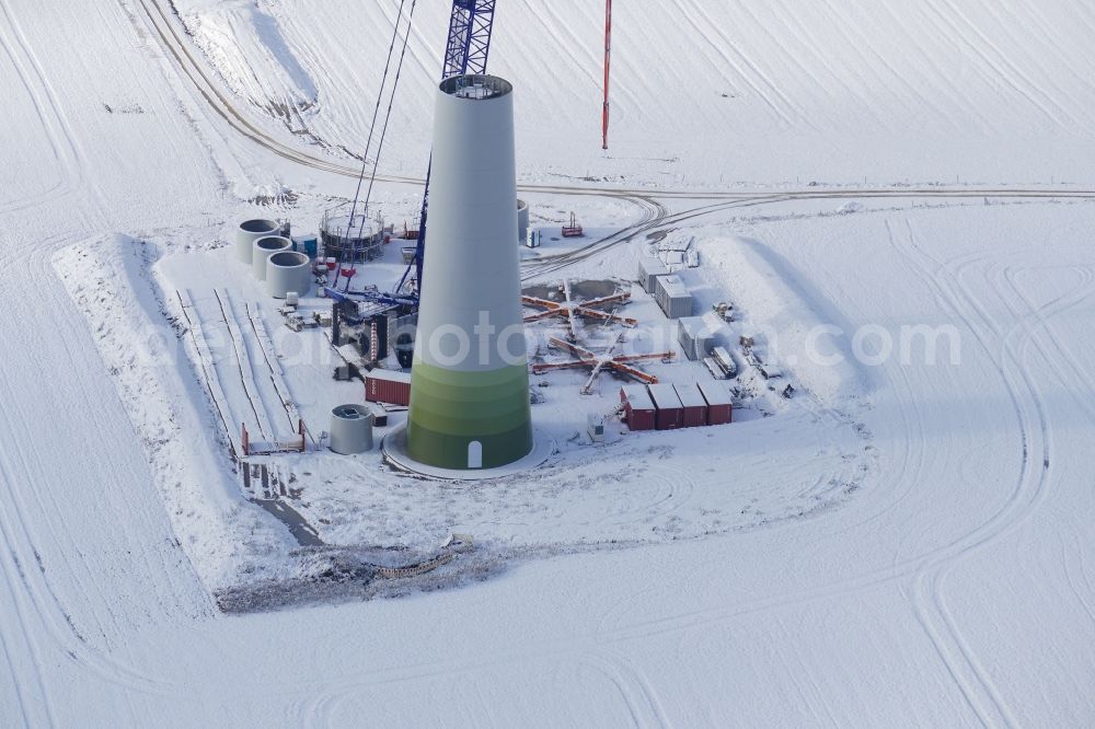 Aerial image Witzenhausen - Wintry snowy Construction site for wind turbine installation in Witzenhausen in the state Hesse, Germany