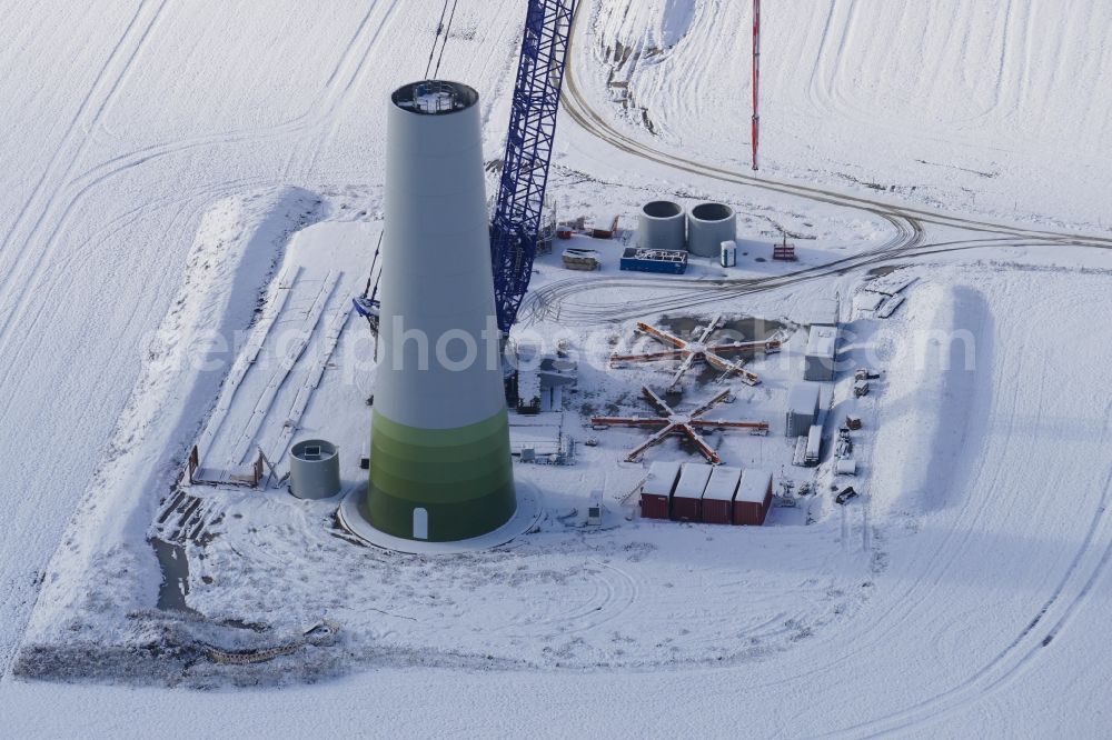 Aerial photograph Witzenhausen - Wintry snowy Construction site for wind turbine installation in Witzenhausen in the state Hesse, Germany