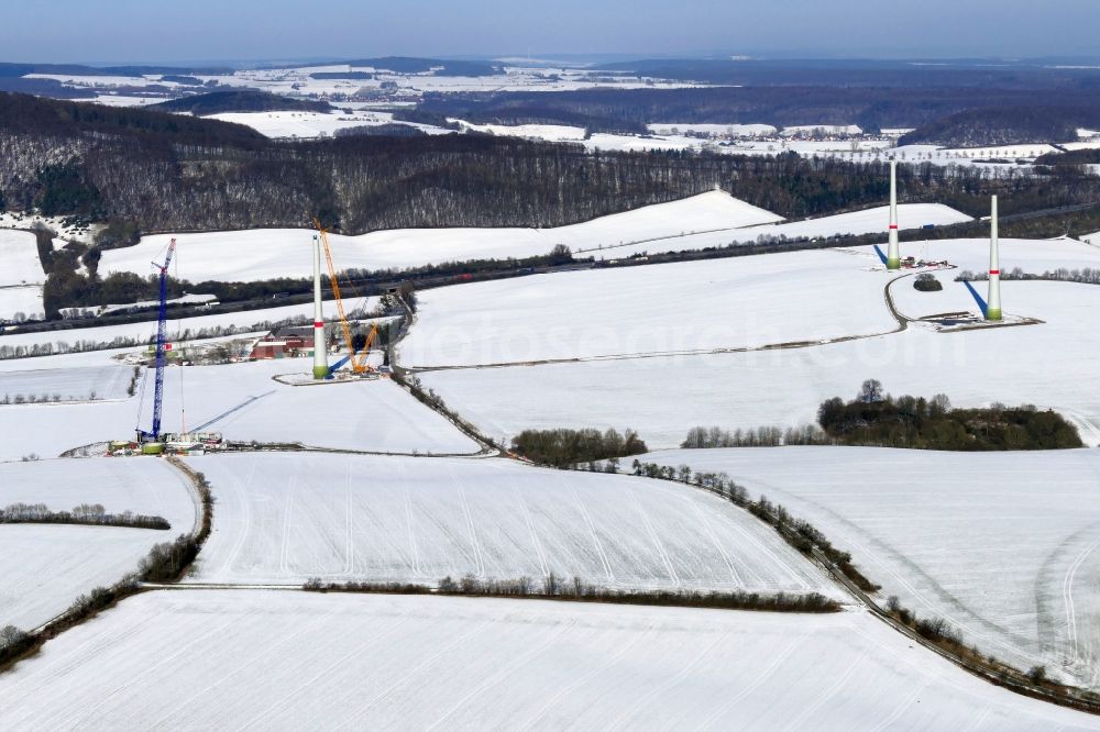 Aerial photograph Witzenhausen - Wintry snowy Construction site for wind turbine installation in Witzenhausen in the state Hesse, Germany